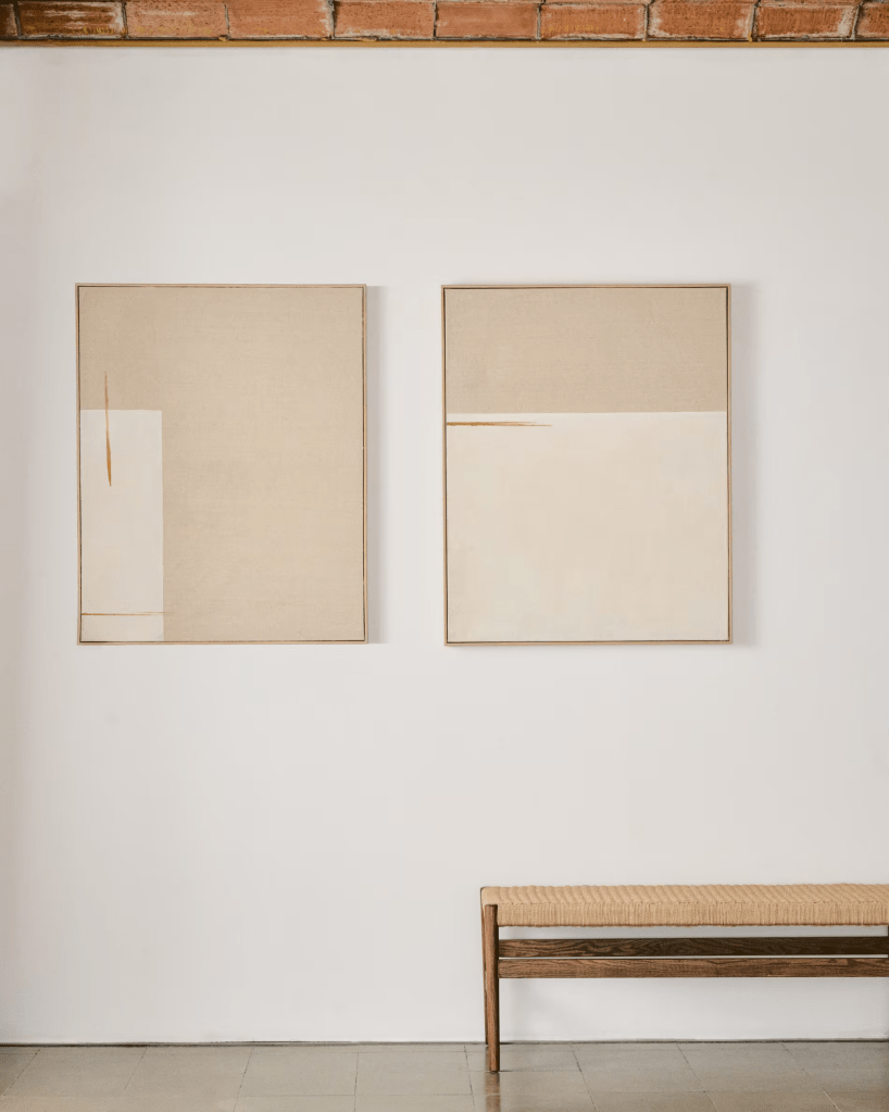 minimal, neutral colored art hanging on a wall